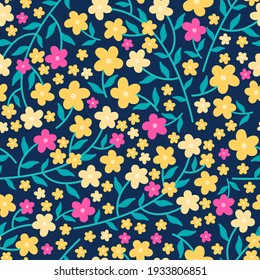 Blooming midsummer meadow seamless pattern. Floral design of bright colorful pink and yellow flowers, leaves and stems on a dark background. Lot of different flowers on the field. Scandinavian style