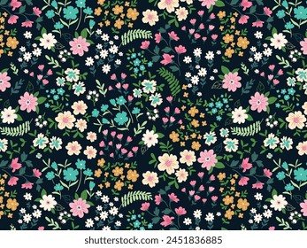 Blooming midsummer meadow seamless pattern. Plant background for fashion, wallpapers, print. A lot of different flowers on the field. Liberty style millefleurs. Trendy floral design