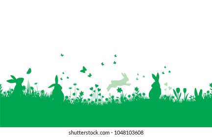 BLOOMING SPRING IN EASTER. BUNNY IN GRASS. FIZZLE FIELD LIFE. 