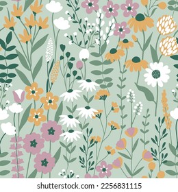 Blooming summer meadow seamless pattern. Repeating floral pattern on green background. Lot of different wild yellow flowers, buds, leaves, stems on the field. Liberty millefleurs. Scandinavian style