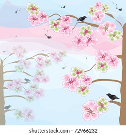 Blossoming apple tree on sunrise background