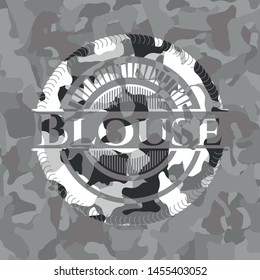 Blouse written on a grey camouflage texture