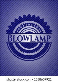 Blowlamp denim background