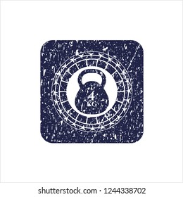Blue 4kg kettlebell icon inside rubber grunge seal