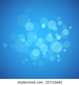 Blue abstract background with defocused lights 