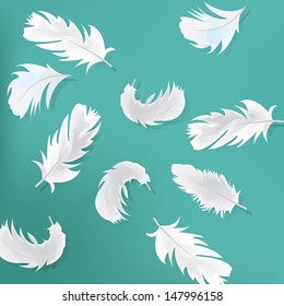 Blue abstract background with feathers
