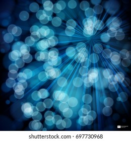 Blue abstract background with rays, bokeh defocused lights.