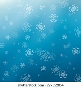 Blue abstract background with snowflakes for your design