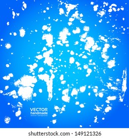 Blue abstract background with splashes of white paint