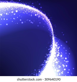 blue abstract glitter trail background made of defocused lights