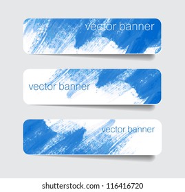Blue abstract paper banners / stickers / badges with hand painted brush strokes background