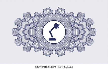 Blue abstract rosette with desk lamp icon inside