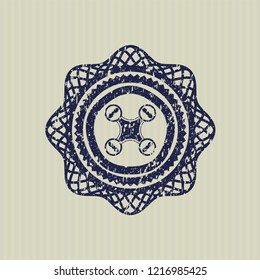 Blue air drone icon inside distressed rubber stamp with grunge texture