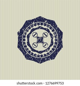 Blue air drone icon inside distressed grunge style stamp