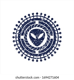 Blaues Außerirdisches Symbol innerhalb einer Gummistruktur