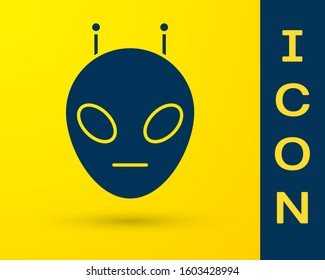 Blue Alien icon isolated on yellow background. Extraterrestrial alien face or head symbol.  Vector Illustration