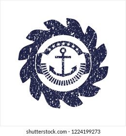 Blue anchor icon inside distressed rubber stamp
