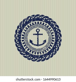 Blue anchor icon inside rubber seal with grunge texture