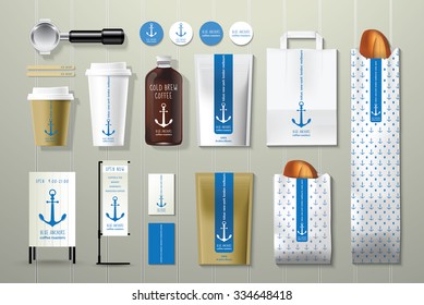 Blue anchors coffee shop corporate identity template design set on wood background