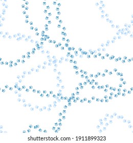 huellas azules de animales distribuidas caóticamente sobre fondo repetitivo blanco. patrón sin costuras vectorial. imagen de color. muestra de tela. papel envolvente. impresión continua. ilustración de invierno