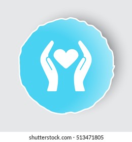Blue app button with Heart care icon on white.