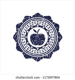 Blue apple icon inside rubber seal with grunge texture