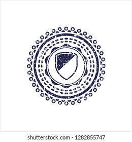 Blue armor icon inside distressed rubber seal