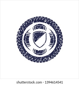 Blue armor icon inside rubber stamp with grunge texture