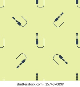Blue Audio jack icon isolated seamless pattern on yellow background. Audio cable for connection sound equipment. Plug wire. Musical instrument.  Vector Illustration