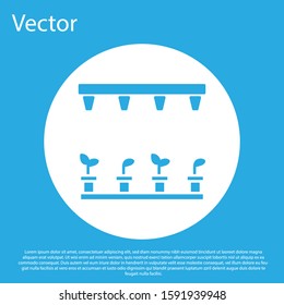 Blue Automatic irrigation sprinklers icon isolated on blue background. Watering equipment. Garden element. Spray gun icon. White circle button. Vector Illustration