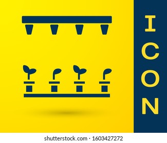 Blue Automatic irrigation sprinklers icon isolated on yellow background. Watering equipment. Garden element. Spray gun icon.  Vector Illustration