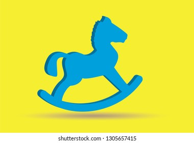 Blue baby rocking horse on a yellow background