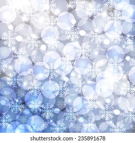 blue background with bokeh lights and snowflake. Perfect template for posters, websites, magazines, brochures, catalogs