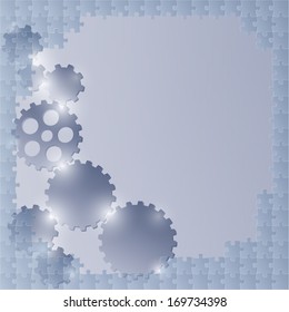 blue background with border of puzzle pieces and cog wheels