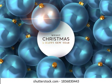 Fondo azul con bolas de Navidad. Baudias redondas decorativas de Navidad realistas. Tarjeta de saludo, banner, afiche, volante, elegante folleto. Feliz Navidad y feliz año nuevo. ilustración vectorial