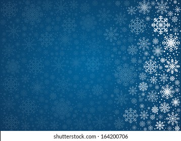 Blue background from frosty snowflakes with copy space, vector pattern