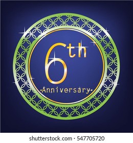 blue background and green circle 6th anniversary