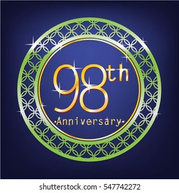 blue background and green circle 98th anniversary