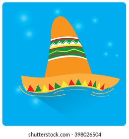 Blue background with an isolated traditional mexican hat.