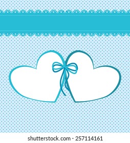 Blue background with lace ribbon, a pattern of small circles and related hearts