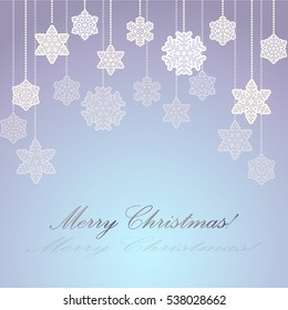 Blue  background with paper snowflakes on a string of beads for greeting cards for  Christmas