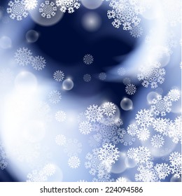 Blue background with snowflakes and place for text. EPS10 vector.