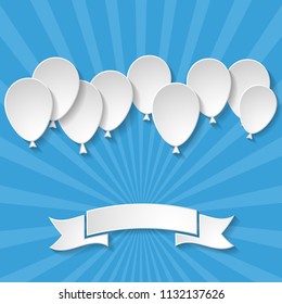 blue background with sun rays, paper balloons and a paper ribbon