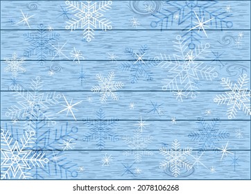 blue background texture of a board with white snowflakes postcard