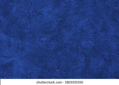 Blue Background. Texture Wall Indigo Color. Abstract Dark Blue Paint  Pattern. Texture Stone Concrete Wall. Rough Grain Backdrop Plaster. Surface Stucco. Design Banner, Wallpaper, Poster, Template