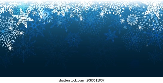 Fondo azul con una variedad de copos de nieve