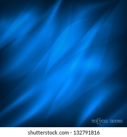 Blue background with waves, the sea surface or shiny silk