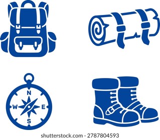 Blue backpack, rolled sleeping bag, compass, and hiking boots arranged for outdoor adventure preparation