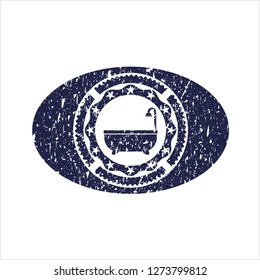 Blue bathtub icon inside rubber stamp