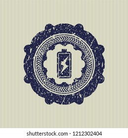 Blue battery charging icon inside grunge seal